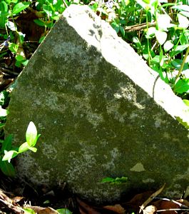 field stone marking unknown grave