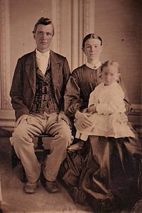 A. W. Bradley, and his wife. Francis Empson Bradley, and their daughter. Enola. circa 1870